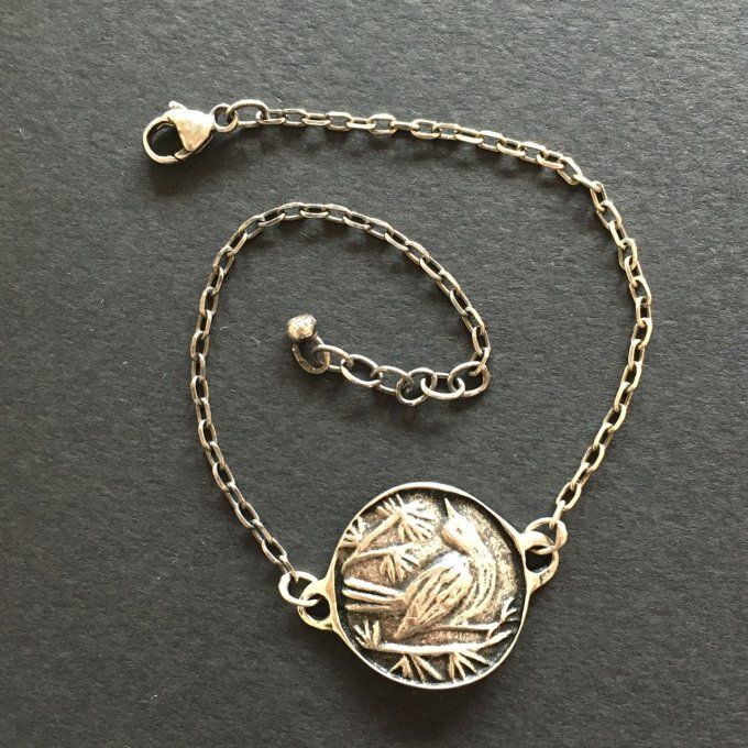 Bracelet argent massif 925/100, médaillon oiseau "bec en l'air". Bijoux Toulhoat (Marie).
