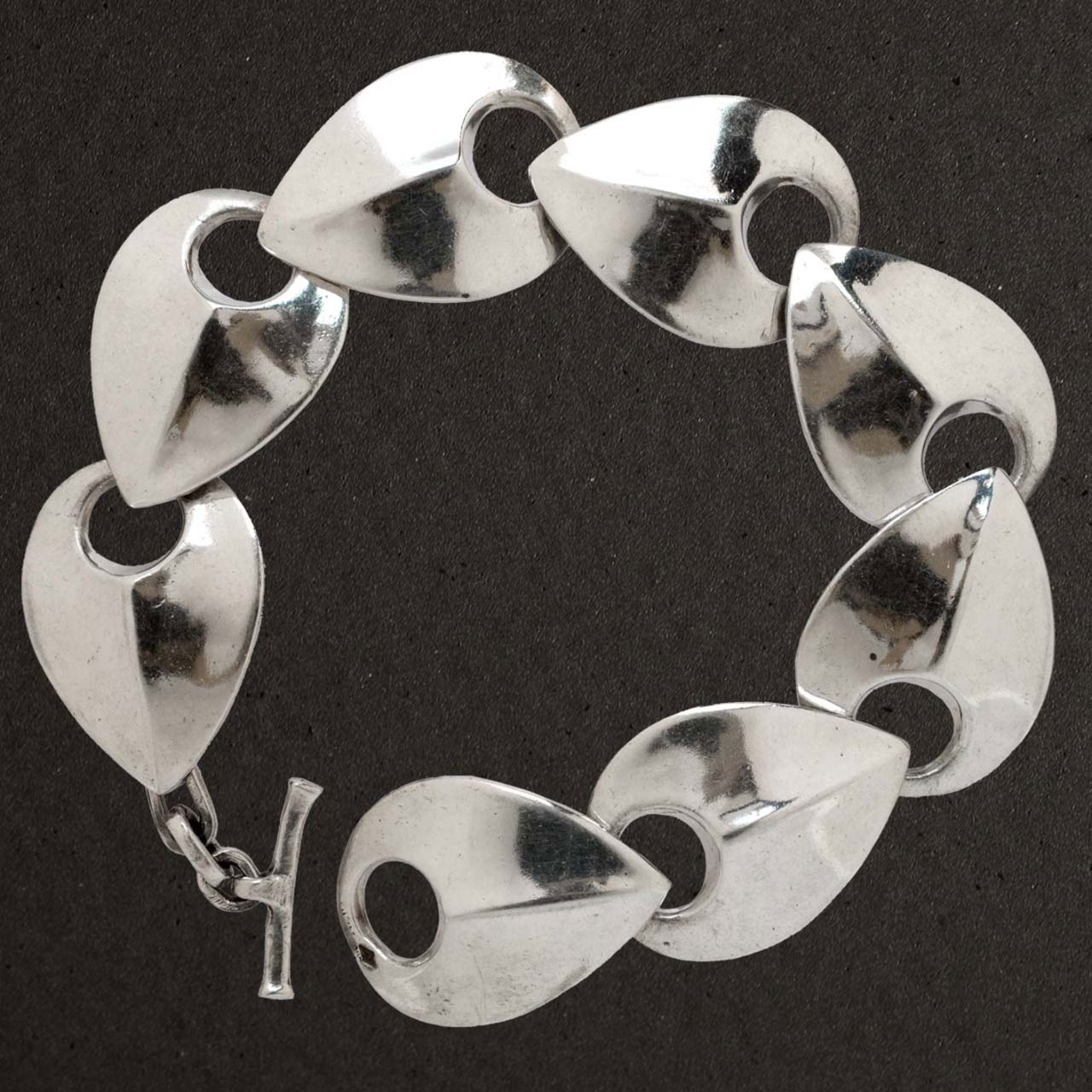 Bracelet articulé argent massif 925/1000 réf. 05528. Écailles (bijoux Pierre Toulhoat).