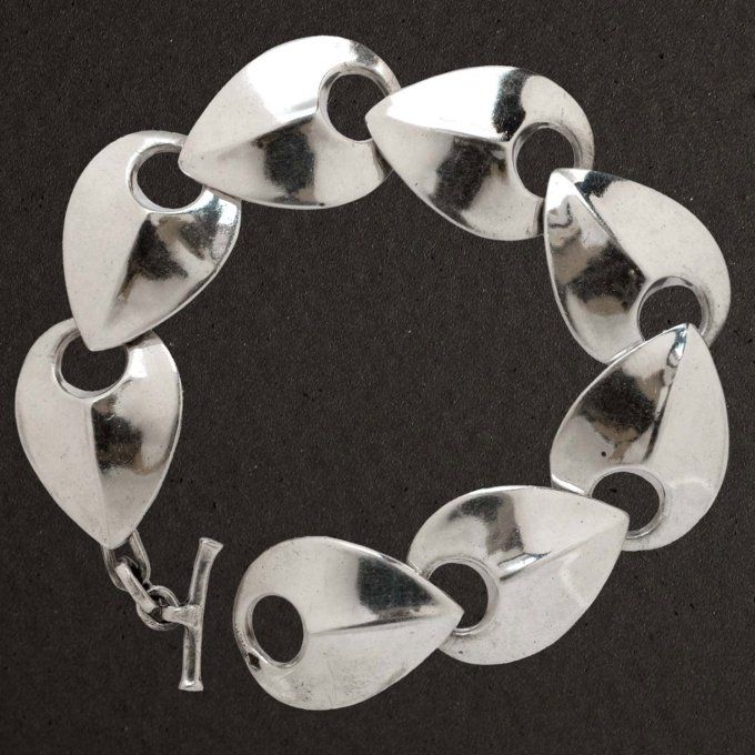 Bracelet articulé argent massif 925/1000. Bijoux Toulhoat (Pierre). Écailles.