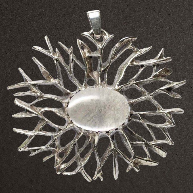 Pendentif argent massif 925/1000 réf. 07725cdr. Bijoux Toulhoat. Étoile avec cristal de roche.