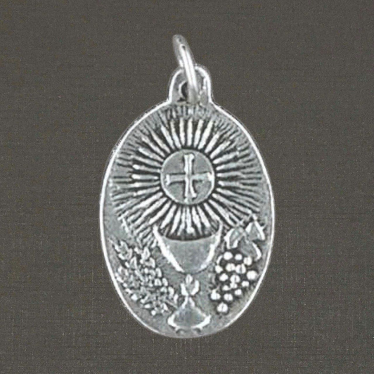 Médaille ovale de communion argent massif 925/1000, bijoux Pierre Toulhoat.
