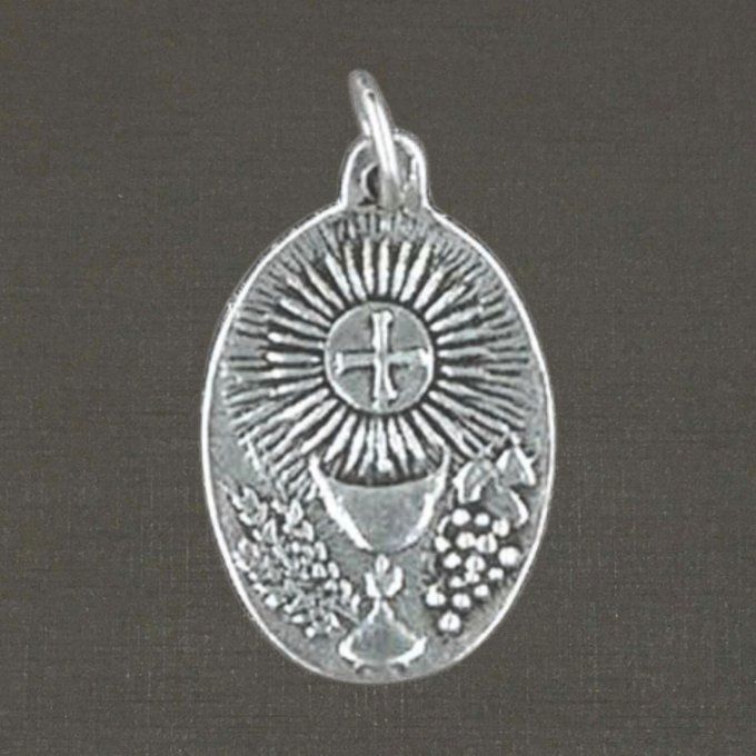 Médaille ovale de communion argent massif 925/1000 réf. 03362, bijoux Pierre Toulhoat.