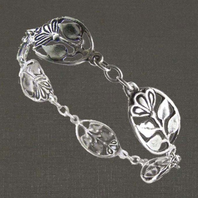 Bracelet articulé argent massif 925/1000 réf. 05585. Médailles fleurs (bijoux Toulhoat).