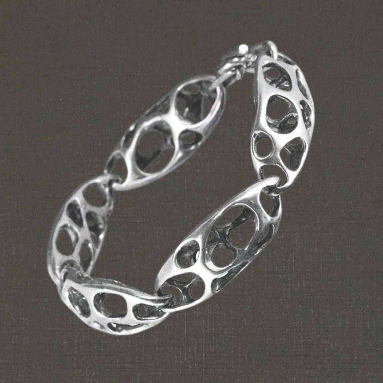 Bracelet articulé argent massif 925/1000 réf. 05590, chaîne baroque. Bijoux Pierre Toulhoat.
