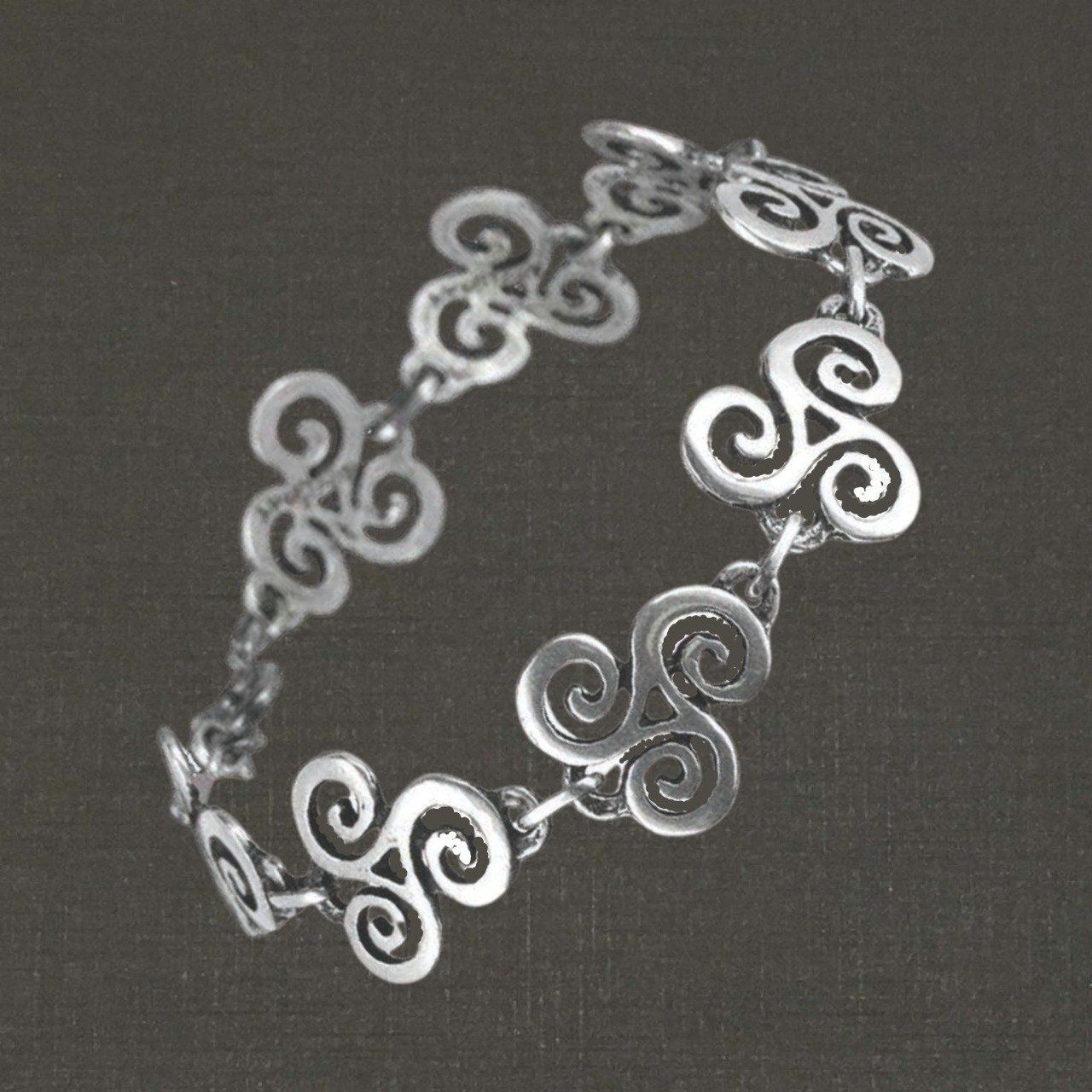 Bracelet articulé argent massif 925/1000 triskels découpés, bijoux Pierre Toulhoat.