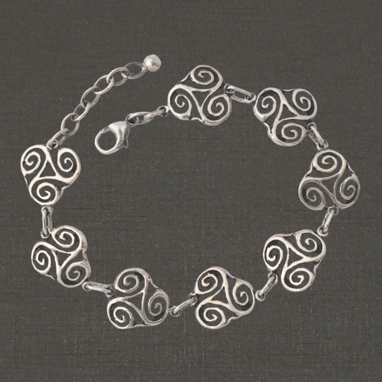 Bracelet articulé argent massif 925/1000 triskels ajourés, bijoux Pierre Toulhoat.