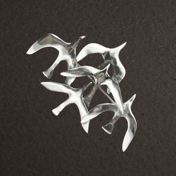 Broche argent massif 925/1000 vol de mouettes (bijoux Toulhoat).